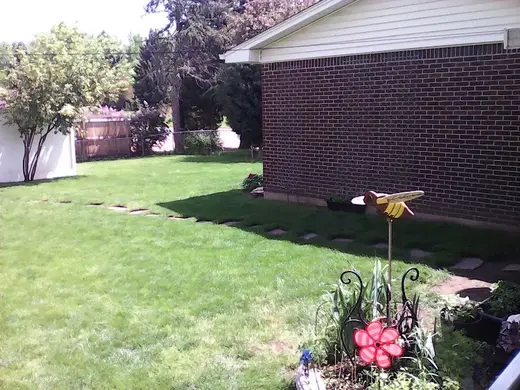 Exterior view of Denver sober living home — grass